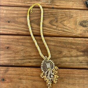 Elegant Gold and Silver Pendant Necklace